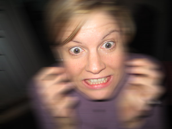 Girl with crazy eyes pondering over the frustrations of hyperglycemia