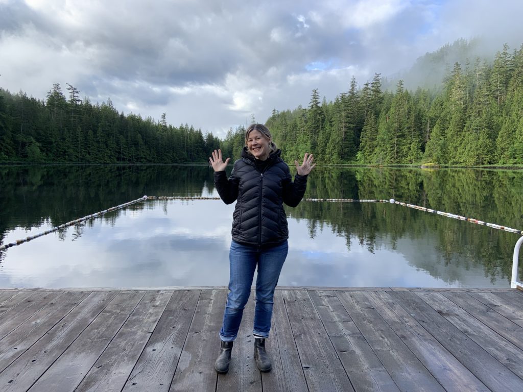 T1D RD Katie Bartel stands on the docks of T1D camp at Evans Lake in Squamish, BC