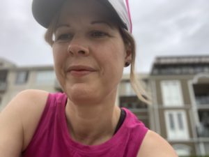 Woman in running clothes considering the benefits of exercise with type-1 diabetes vs, the challenges